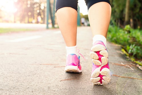 Close up of the trainers of someone walking outdoors